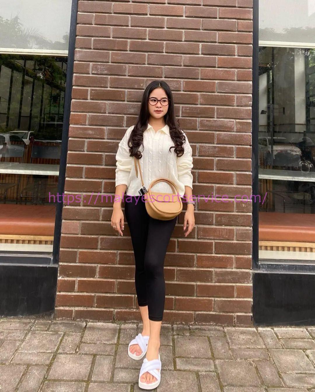 Naila, escort in Kuala Lumpur from Malay Escort Service.