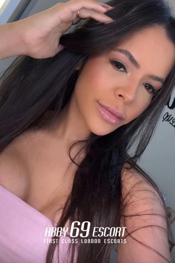 Holly, escort in London from Abby 69 Escort.