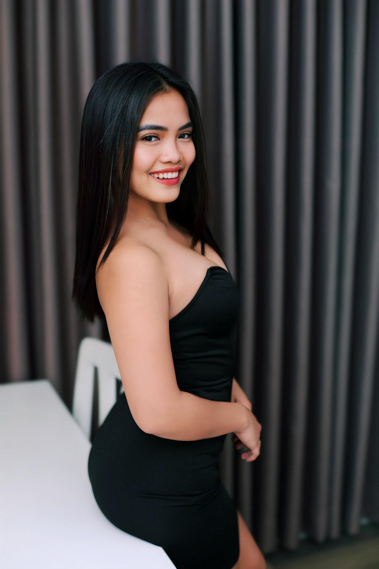 Regina, escort in Manila from Manila Courtesans.